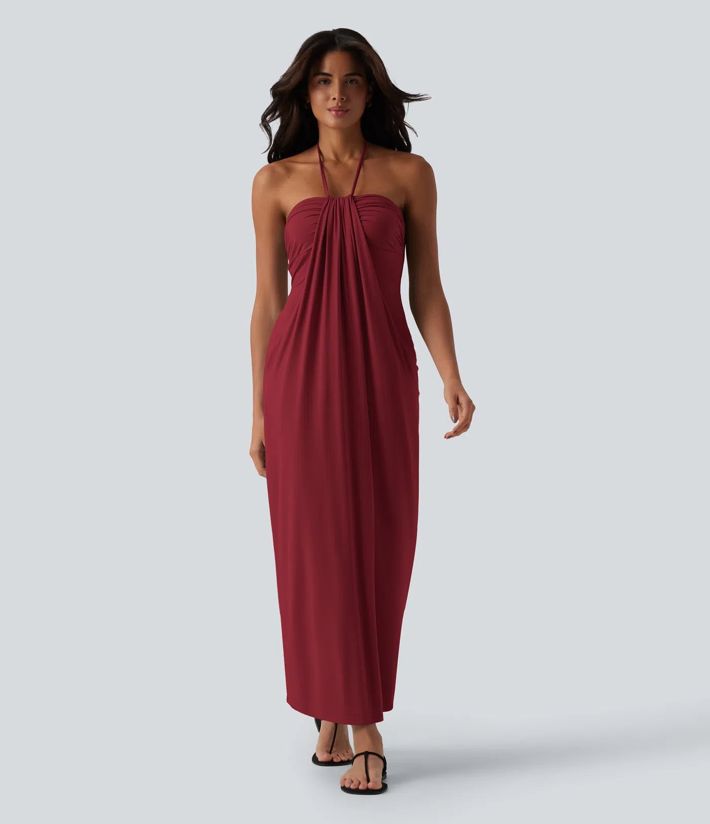 Vestido largo con cuello halter y bolsillos laterales