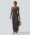 Vestido largo con cuello halter y bolsillos laterales