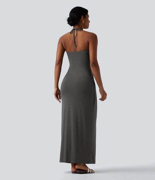 Vestido largo con cuello halter y bolsillos laterales